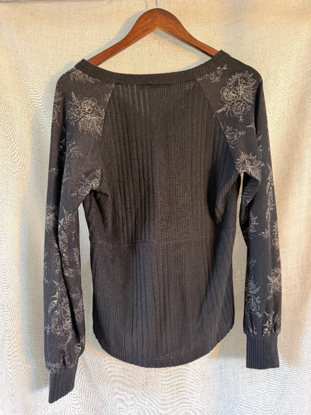 Black sweater with details on arms size small